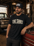 The Hat by Nine Sixteen Supply Co. worn in a vintage garage