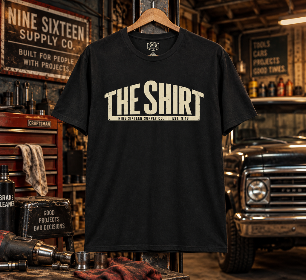 THE SHIRT graphic tee in a vintage garage workshop by Nine Sixteen Supply Co.