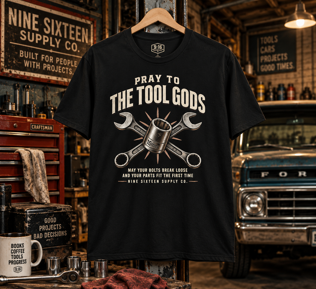 Pray to the Tool Gods graphic tee in a vintage garage workshop by Nine Sixteen Supply Co.
