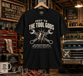 Pray to the Tool Gods graphic tee in a vintage garage workshop by Nine Sixteen Supply Co.